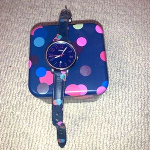 fosil watch with tin holder